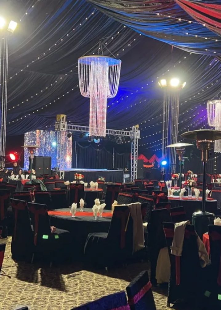 Oasis marquee interior with chandelier and stage
